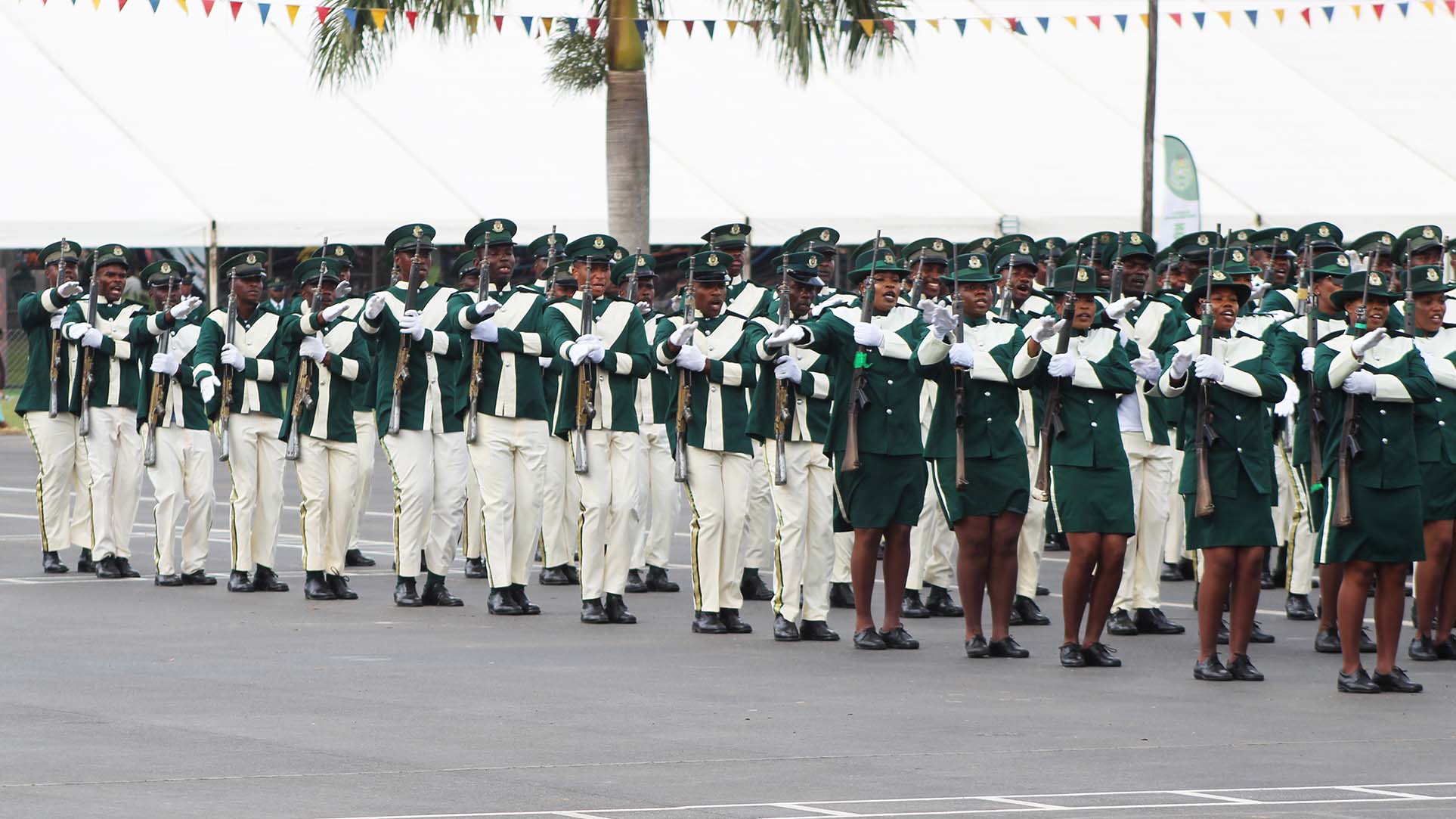His Majesty Correctional Services officers display disciplined and coordinated drills before Their Majesties during the 18th Correctional Services Day celebrations at the Correctional Staff College in Matsapha, showcasing professionalism and fitness.